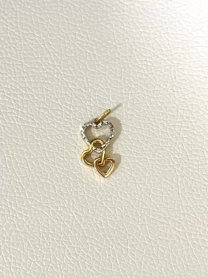 PHP 3,500 18K gold tricolor heart pendant on